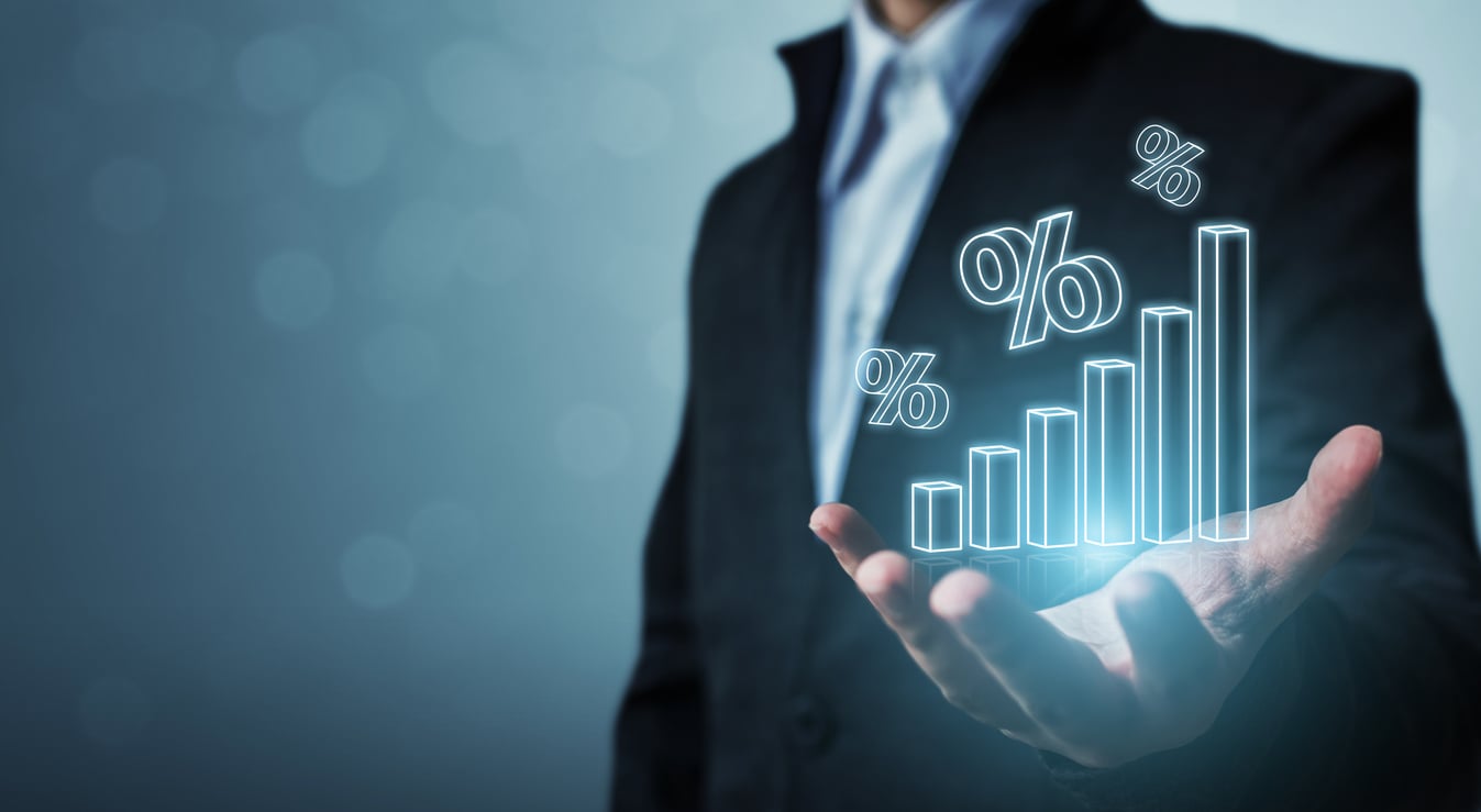 Interest rate financial and mortgage rates concept. Businessman hand show icon percent 3d sign with graph indicator